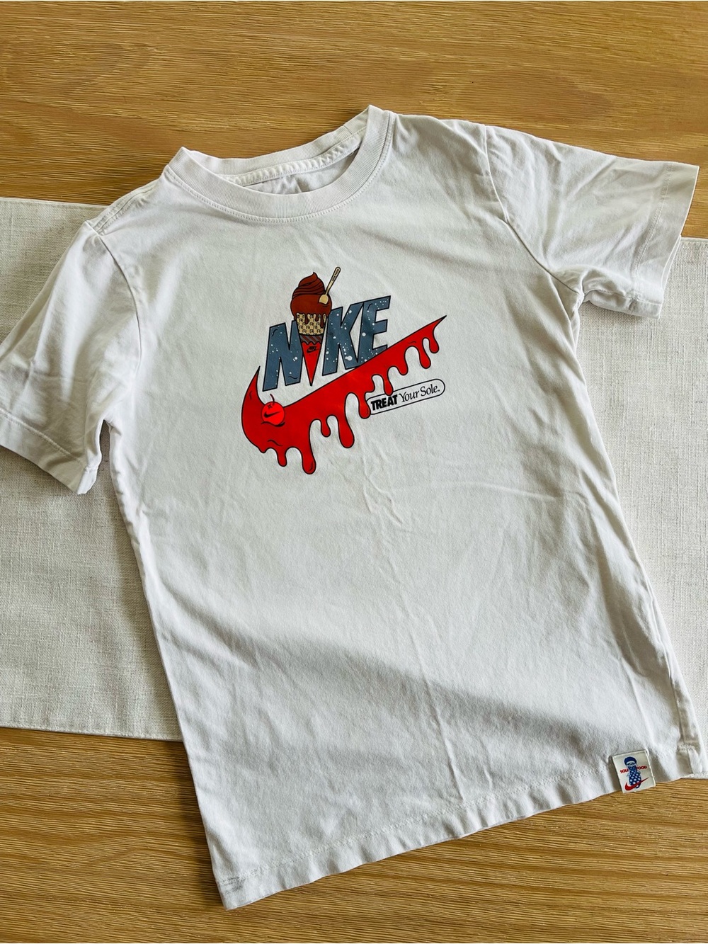 Nike White Kids T-Shirt with Red & Blue Graphic